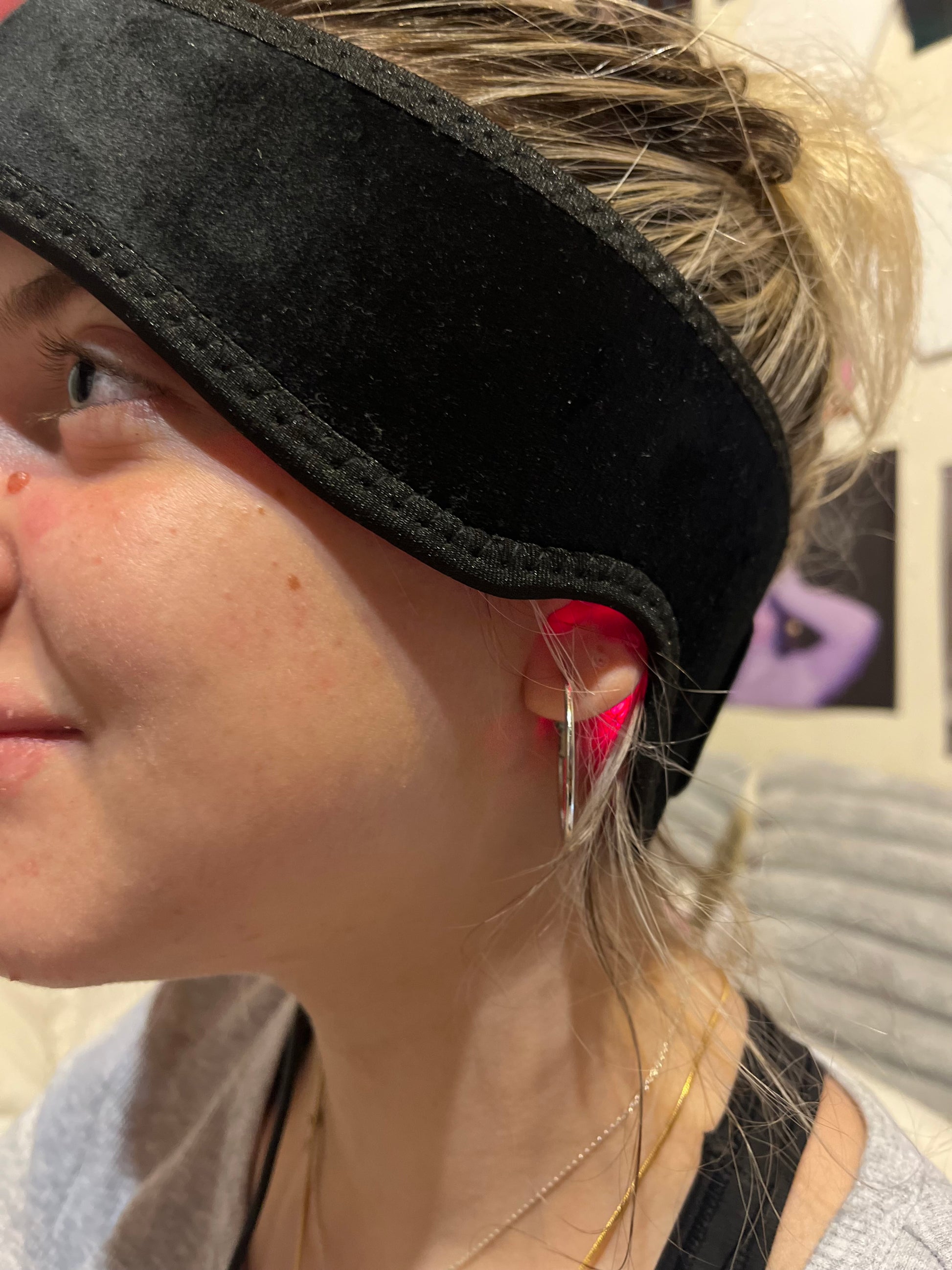 Red light therapy headband in use
