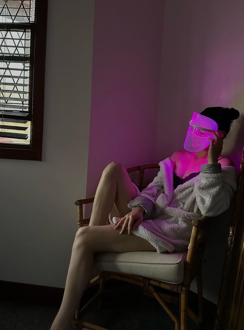 Girl wearing LED face mask - Red Light LED Therapy Face Mask for Skincare