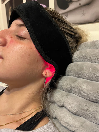 Red light therapy headband in use close up