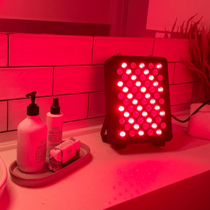 Small Red Light Therapy Panel in bathroom